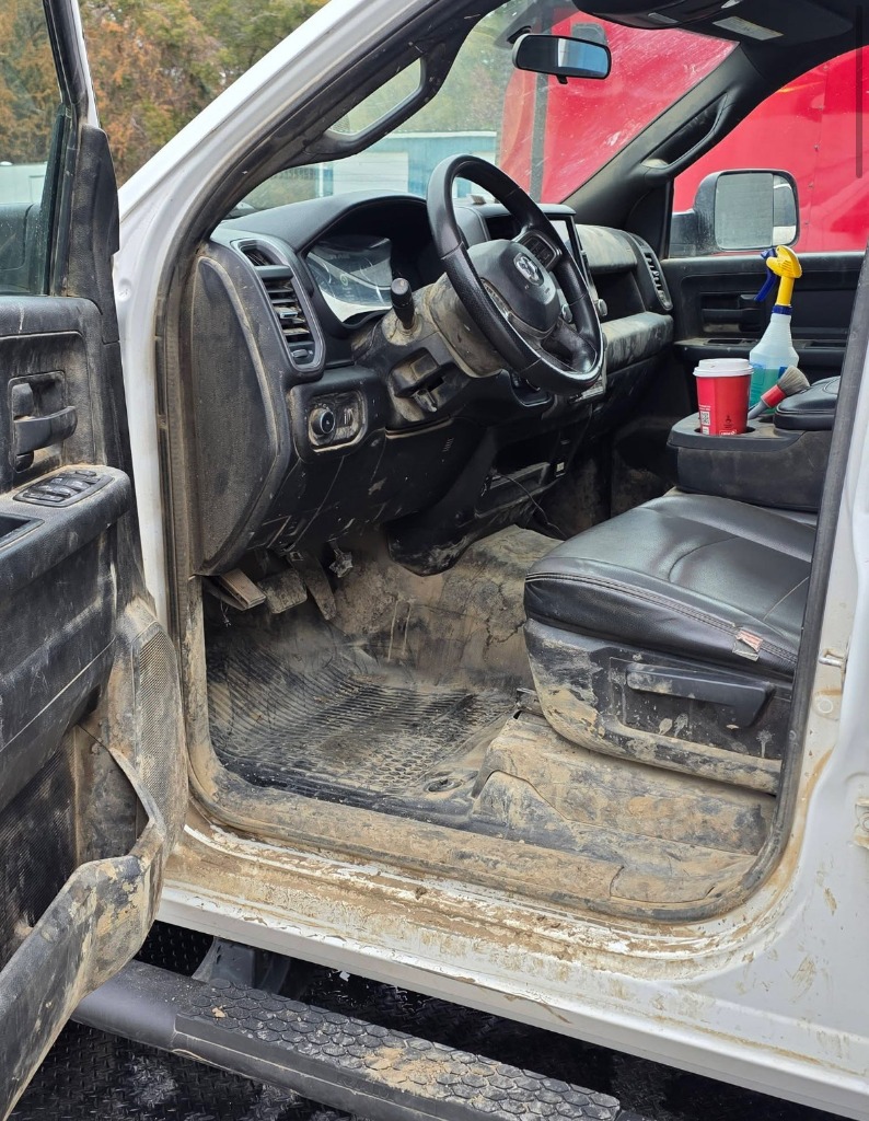Work truck interior covered in mud and road salt before heavy duty car carpet shampooing in Layton UT