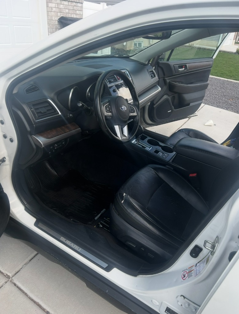 Restored Subaru floor mats after deep car carpet shampooing and auto interior cleaning in Brigham City Utah